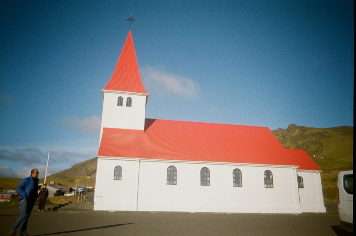 White church with a red roof in Iceland